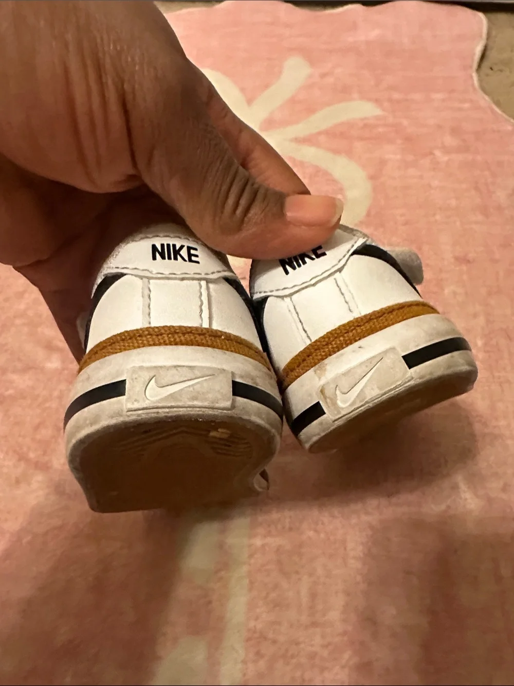 Nike Kids White Sneakers with Black Swoosh and Tan Trim